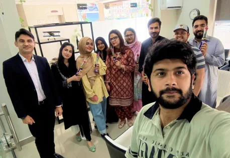 The Prodzyn team taking a group selfie in the office